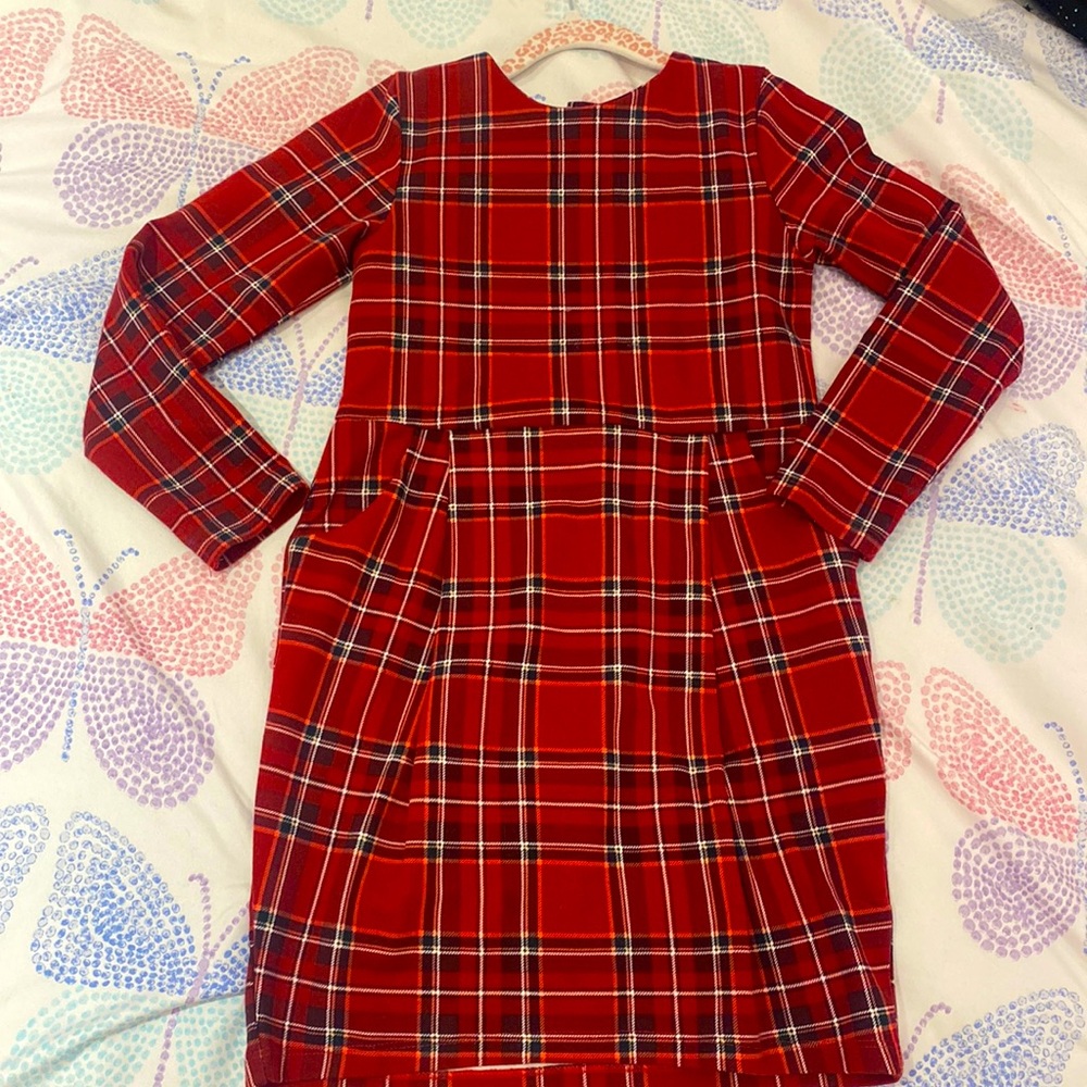 Beautiful red plaid dress by H&M kids . Long sleeve with pockets.